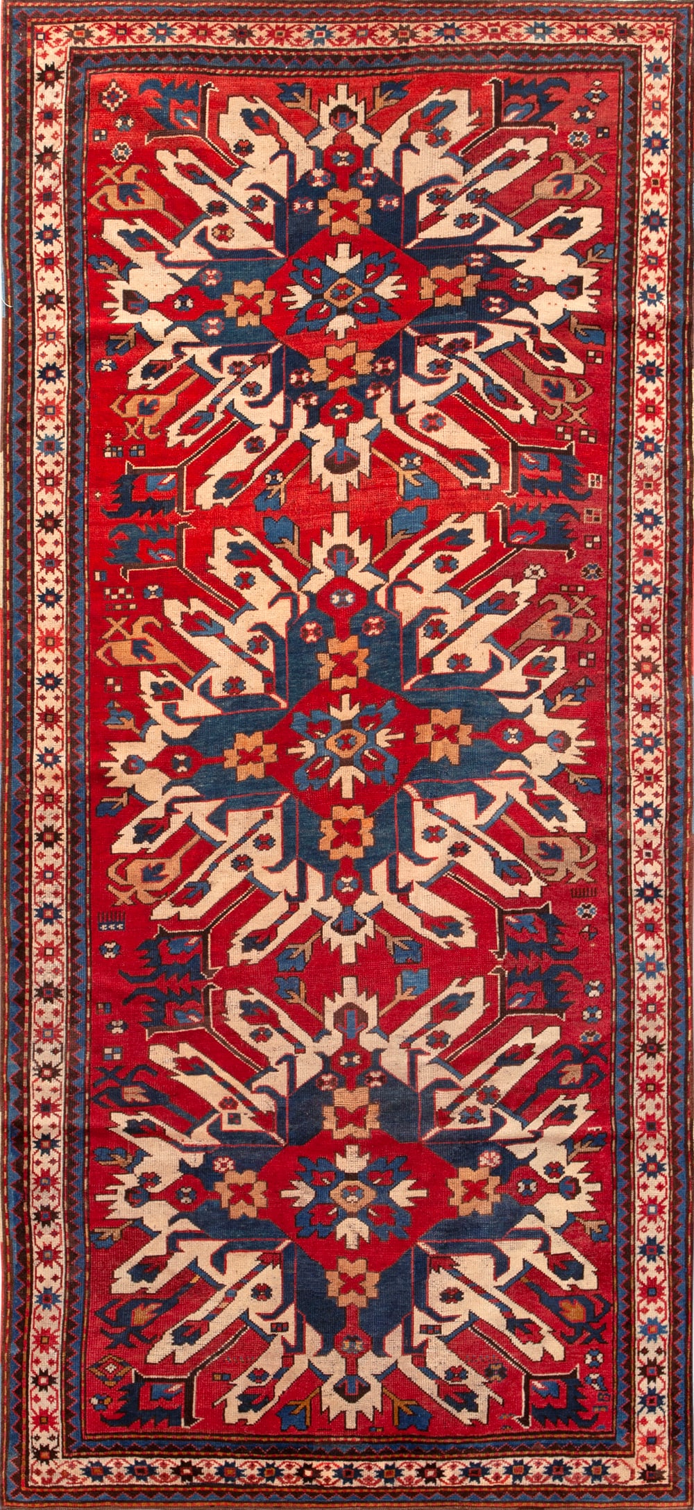 Antique Caucasian Eagle Kazak Rug 9 ft 4 in x 4 ft 5 in (2.84 m x 1.34 m): Curated collection of antique, vintage and modern rugs Antique Caucasian Kazak Rug Size: 9 ft 4 in x 4 ft 5 in (2.84 m x 1.34 m) Provenance: Property of New York dealer An antique Caucasian Kaza