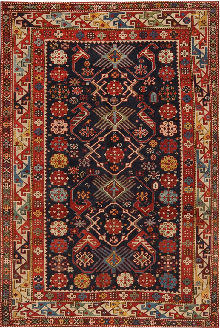 Antique Caucasian Shirvan Rug - 5 ft 5 in x 3 ft 10 in (1.65 m x 1.16 m): Curated collection of antique, vintage and modern rugs Antique Caucasian Shirvan Rug Size: 5 ft 5 in x 3 ft 10 in (1.65 m x 1.16 m) Provenance: From an Italian collector Circa 1880 A decorative