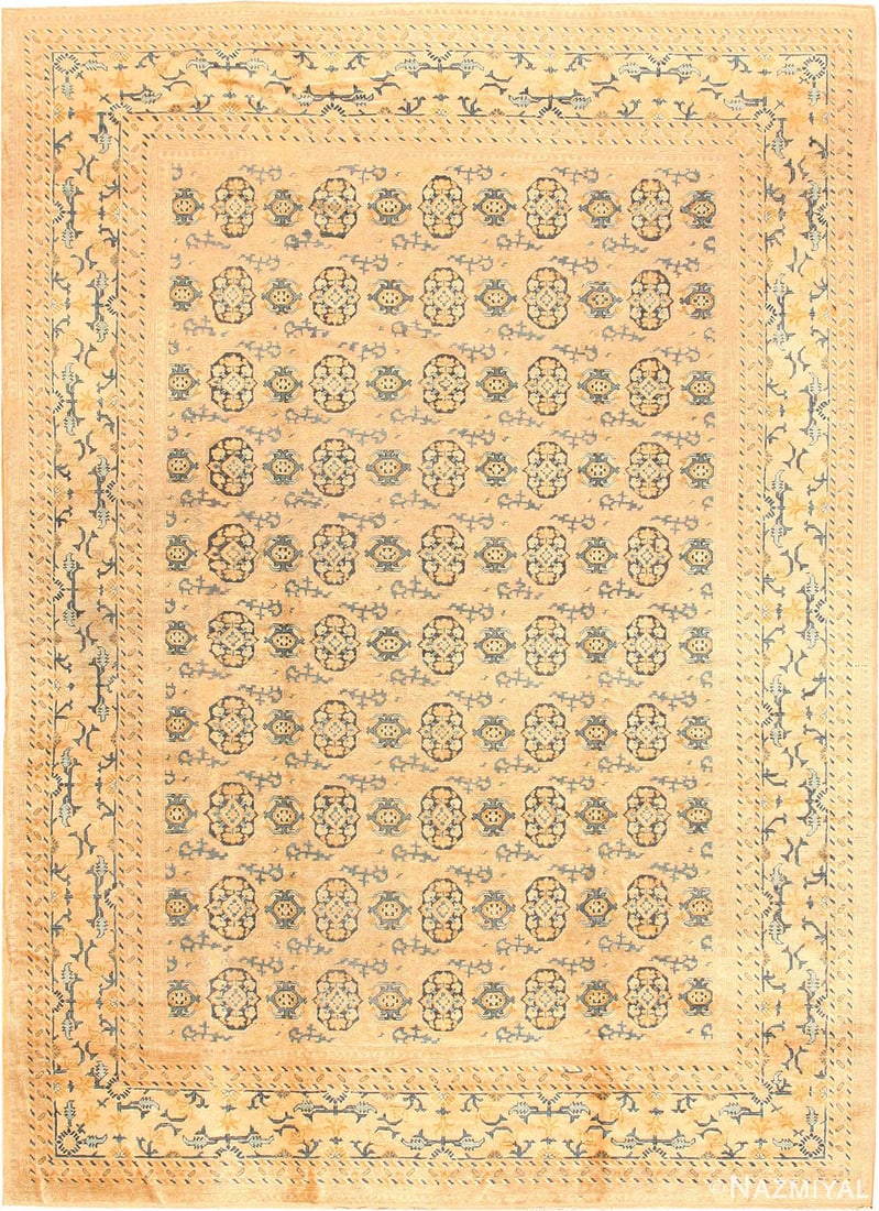 Antique East Turkestan Khotan Rug - 13 ft 1 in x 9 ft 5 in (3.99 m x 2.87 m): Curated collection of antique, vintage and modern rugs Antique East Turkestan Khotan Rug Size: 13 ft 1 in x 9 ft 5 in (3.99 m x 2.87 m) Provenance: From a New York residence Circa 1900 A handsom