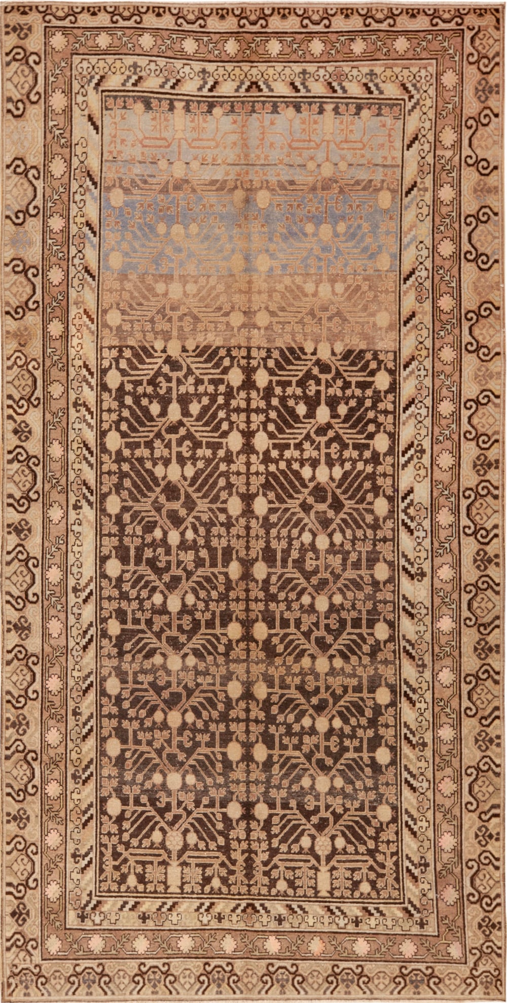 Vintage East Turkestan Khotan Rug - 11 ft 3 in x 5 ft 6 in (3.43 m x 1.68 m): Curated collection of antique, vintage and modern rugs Vintage East Turkestan Khotan Rug Size: 11 ft 3 in x 5 ft 6 in (3.43 m x 1.68 m) Provenance: Property of a retired New York dealer A decora
