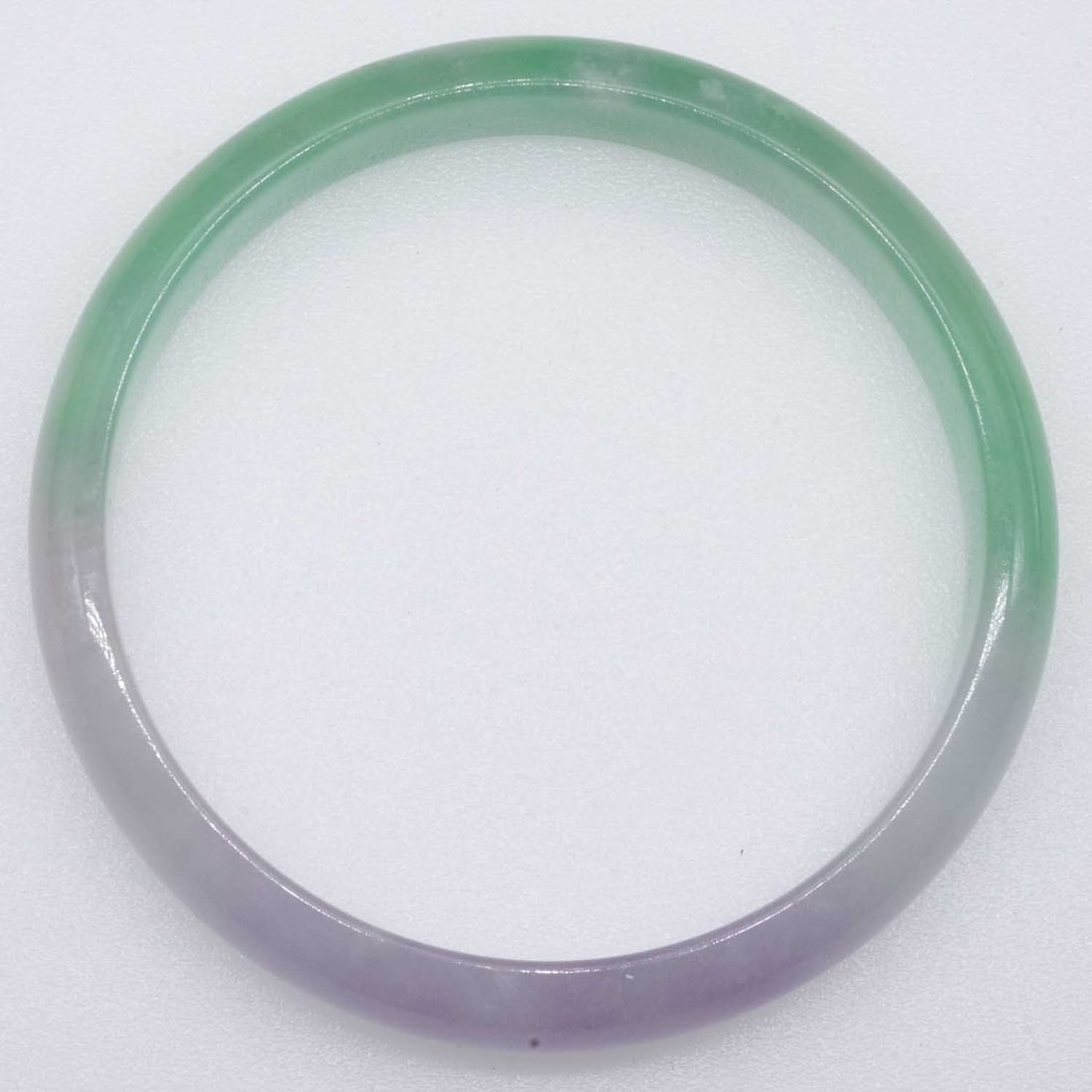 Green And Purple Jade Bangle: Medium: Green And Purple JadeSize: 2 1/4 inner diameterAge/Detail: Condition: Great, check photo for detailProvenance:Collection from Estate in TribeccaPlease view all the photos as they are part of t