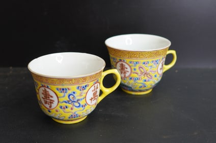 Small Pair Of Chinese Yellow-ground Famille Rose Cups, Guangxu Period