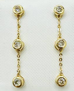 14KT Yellow Gold Pair of Natural Diamond Hanging Earrings # 2078: # 2078 14KT Yellow Gold Pair of Natural Diamond Hanging Earrings 6 Pieces Diamond 0.35 carat(t.w.) Earrings Weight: 1.70 grams Push backs Earrings size: 29 mm x 4.20 mm