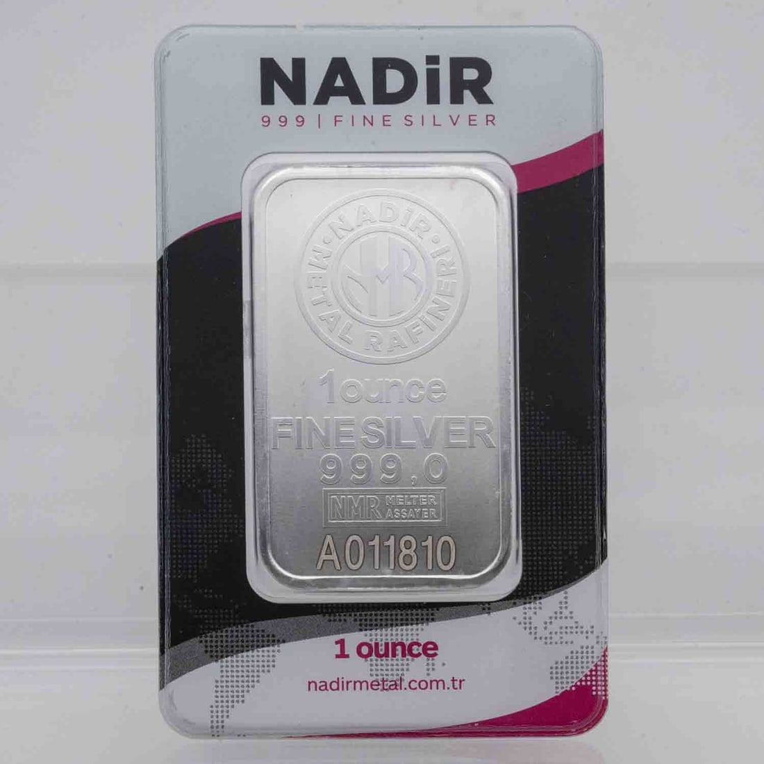 Nadir 1oz Silver Bar In Assay: Subject: Nadir 1oz Silver Bar In Assay Medium: 999 Silver Condition: MS, original package, sample photo, serial number will be different Note: Any condition statement is given as an opinion and should