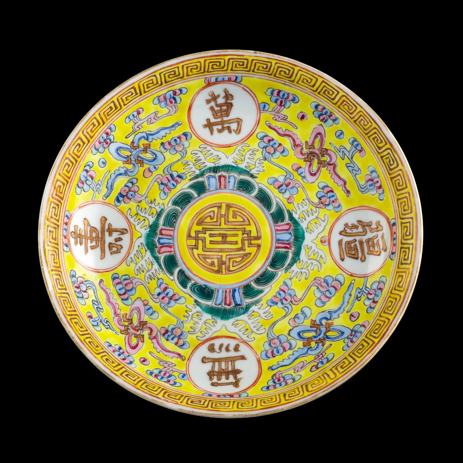 A Chinese yellow-ground famille rose 'shou' plate, Guangxu period, Qing dynasty