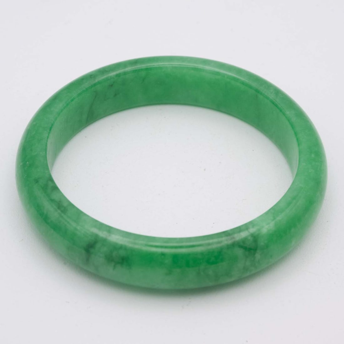 Chinese Green Jade Bangle: Medium: Green Jade Size: 2.3 inches Age/Detail: Chinese Condition: great overall, check photo for condition reference. Provenance: Collection from Estate in Tribecca LiveShipping is NOT a part of the 