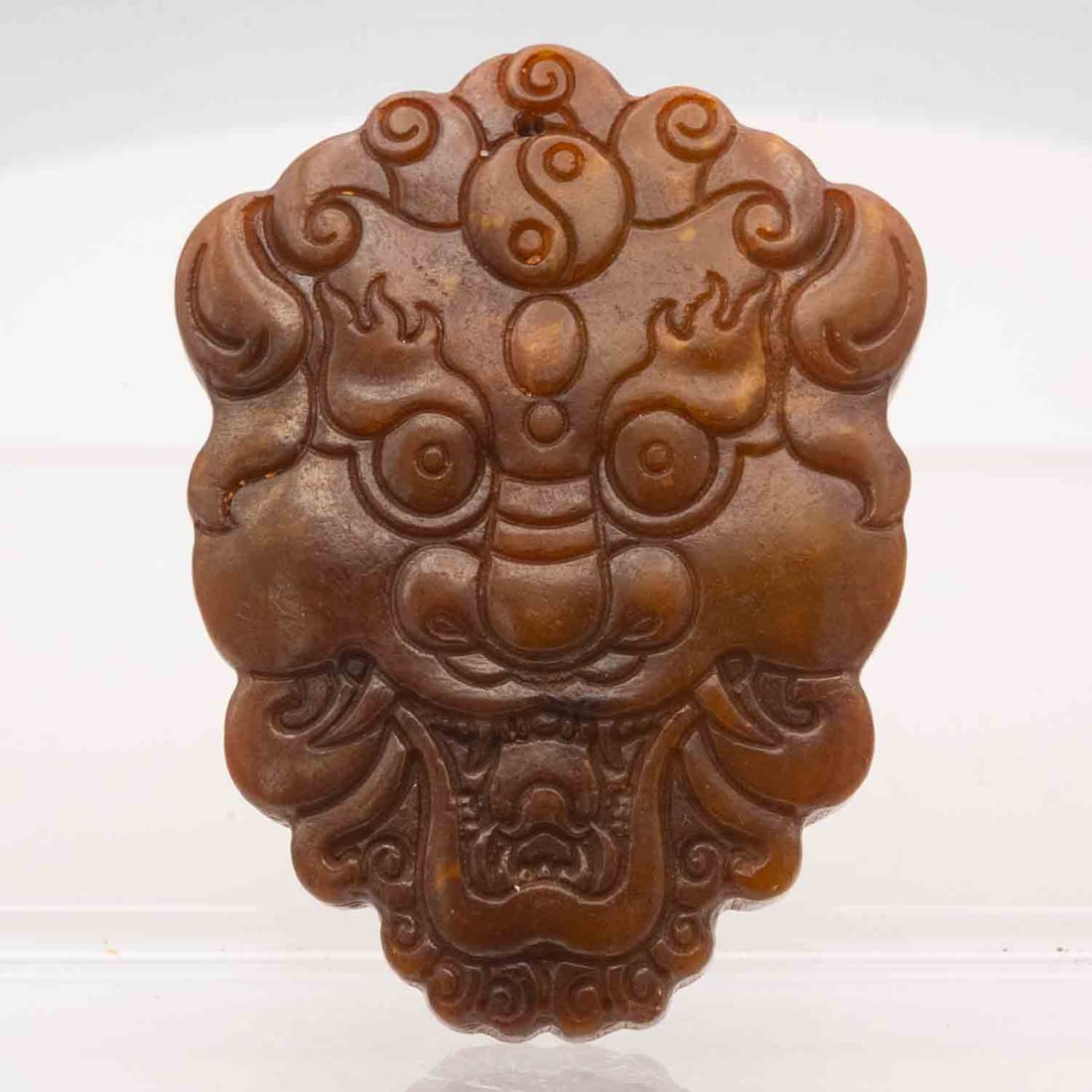 Chinese Carved Jade Beast Face Ornament: Medium: Jade Size: 3.1x2.5x0.5 inches Age/Detail: Chinese Carved Condition: great overall, check photo for condition reference Provenance: Collection from Estate in Tribecca Please view all the photos