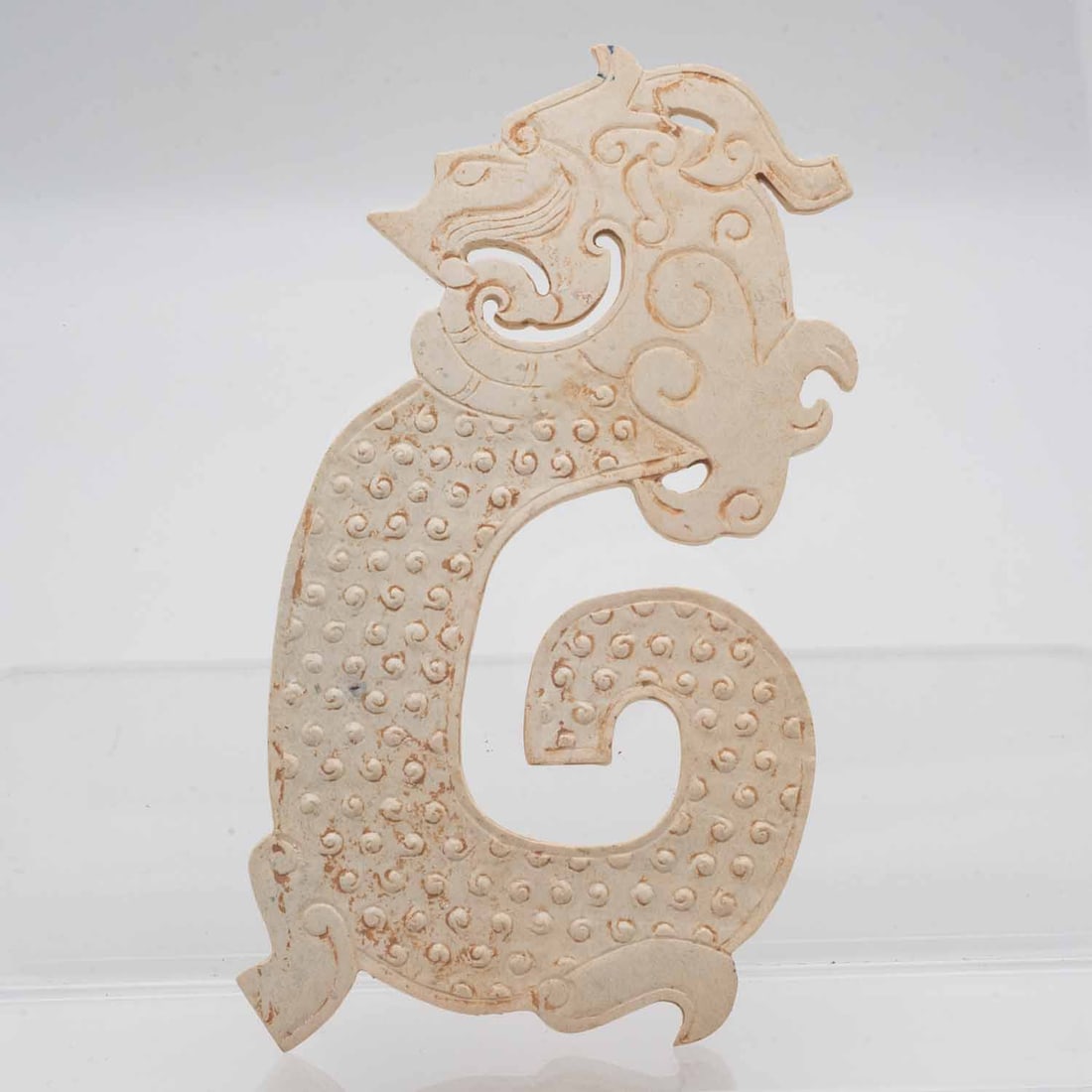 Chinese Carved Calcified Jade Dragon Ornament: Medium: Calcified Jade Size: 6.3x3.3x0.2 inches Age/Detail: Chinese Carved Condition: great overall, check photo for condition reference Provenance: Collection from Estate in Tribecca Please view all 