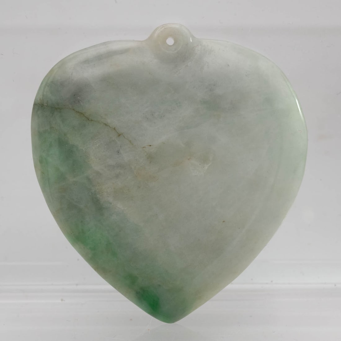 Chinese Carved Jadeite Leaf Pendant: Medium: Jadeite Size: 1.7x1.8x0.2 inches Age/Detail: Chinese Carved Condition: great overall, check photo for condition reference. Provenance: Collection from Estate in Tribecca LiveShipping is NOT a 