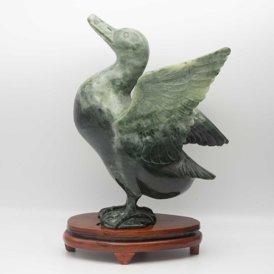 Carved Green Jade Duck Sculpture: Medium: Green Jade Size: 9x3x7 inches Age/Detail: Carved Condition: Great, check photo for condition reference Provenance: Collection from Estate in Tribecca Please view all the photos as they are par