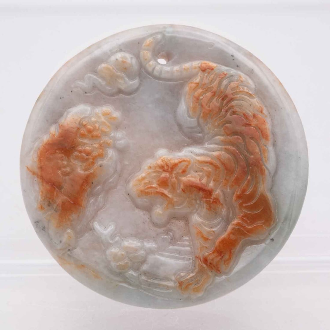 Chinese Carved Natural Type A Jadeite Tiger Pendant: Medium: Natural Type A Jadeite Size: 1.8x1.8x0.3 inches Age/Detail: Chinese Carved Condition: great overall, check photo for condition reference. Provenance: Collection from Estate in Tribecca LiveShi