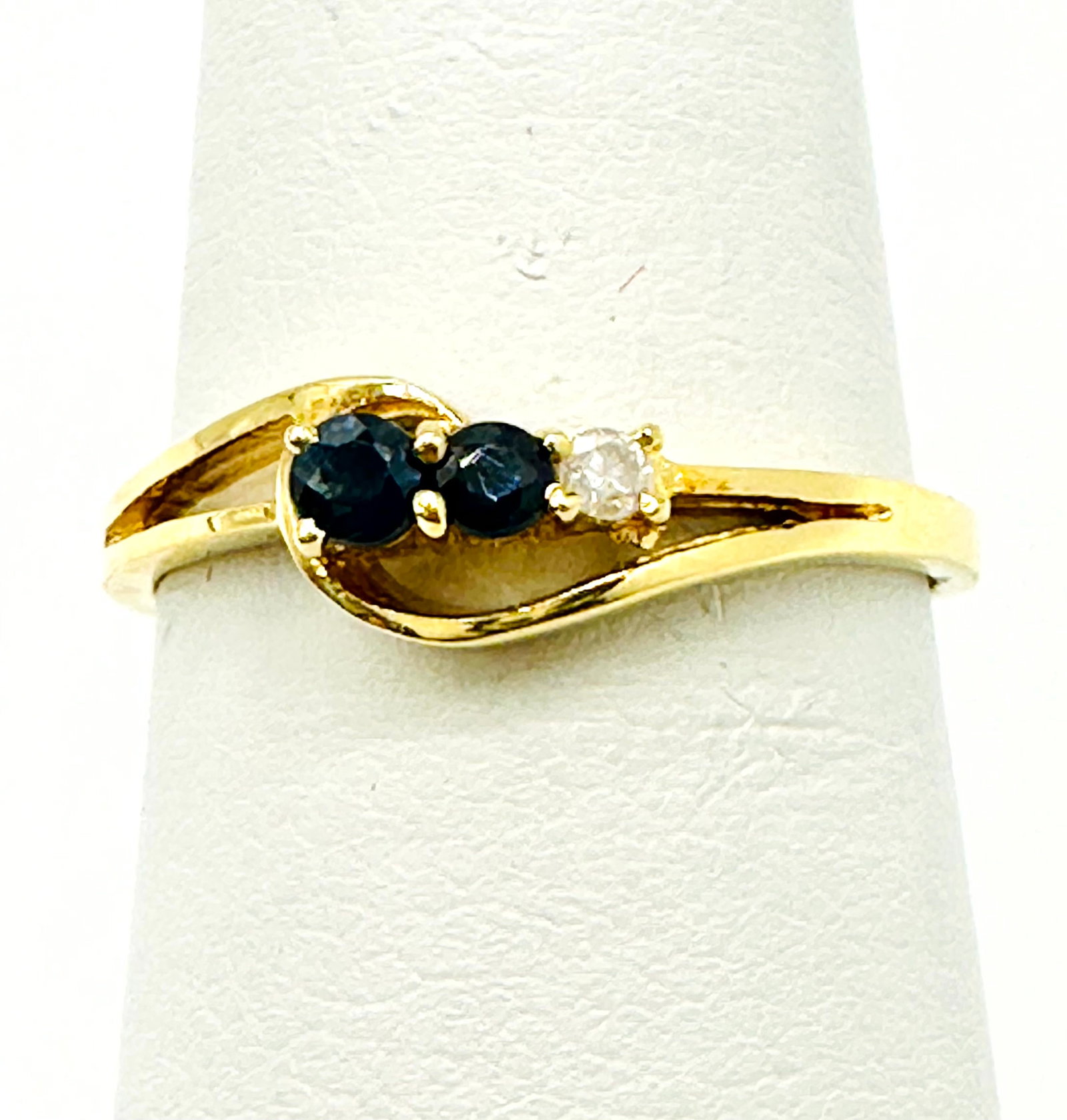 Natural Diamond and Sapphire Ring, 14KT Yellow Gold # 2248: # 2248 Natural Diamond and Sapphire Ring, 14KT Yellow Gold 1 piece diamond 0.03 carat 2 pieces sapphire 0.15 carat(t.w.) Ring Weight: 1.60 Grams Ring Size 6.5