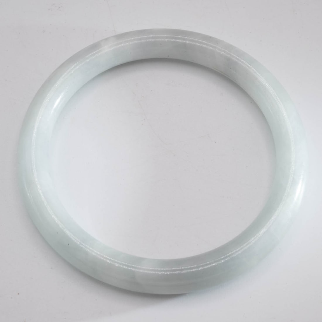 Chinese White Jade Bangle: Medium: White Jade Size: 2.2 inches inner diameter Age/Detail: Chinese Condition: great overall, check photo for condition reference. Provenance: Collection from Estate in Tribecca LiveShipping is NOT