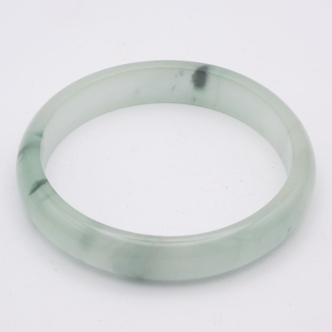 Chinese Green And White Jade Bangle: Medium: Green And White Jade Size: 2.4 inches Age/Detail: Chinese Condition: great overall, check photo for condition reference. Provenance: Collection from Estate in Tribecca LiveShipping is NOT a pa