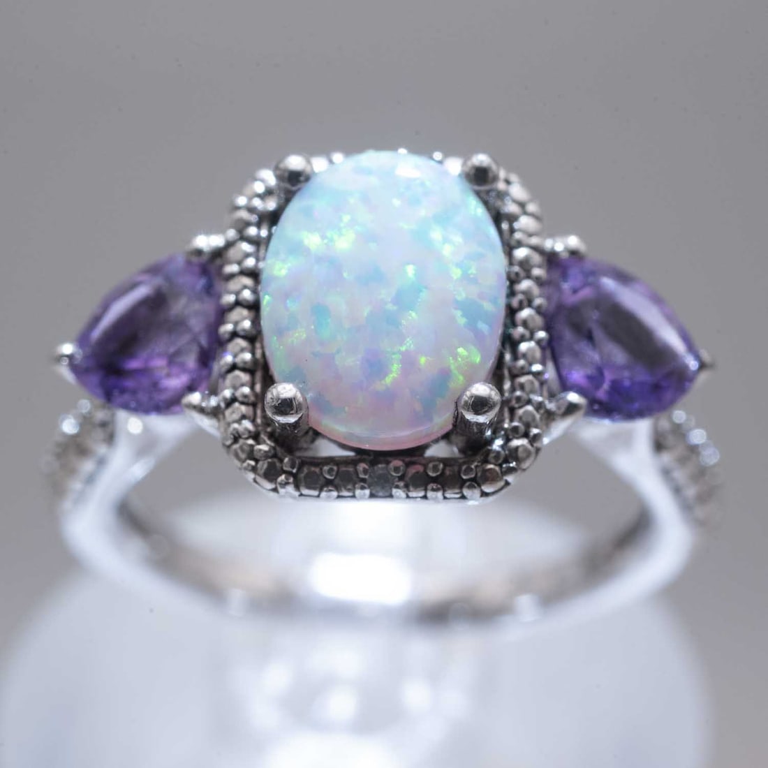 Sterling Silver Opal And Amethyst Ring: Medium: Opal And Amethyst Size: US7 3.9gram Age/Detail: Sterling Silver Condition: great overall, check photo for condition reference. Provenance: Collection from Estate in Tribecca LiveShipping is NO
