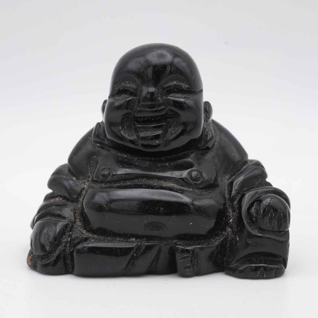 Old Chinese Carved Black Obsidian Buddha Sculpture: Medium: Black Obsidian Size: 2x1.8x1 inches Age/Detail: Old Chinese Carved Condition: great overall, check photo for condition reference Provenance: Collection from Estate in Tribecca Please view all 