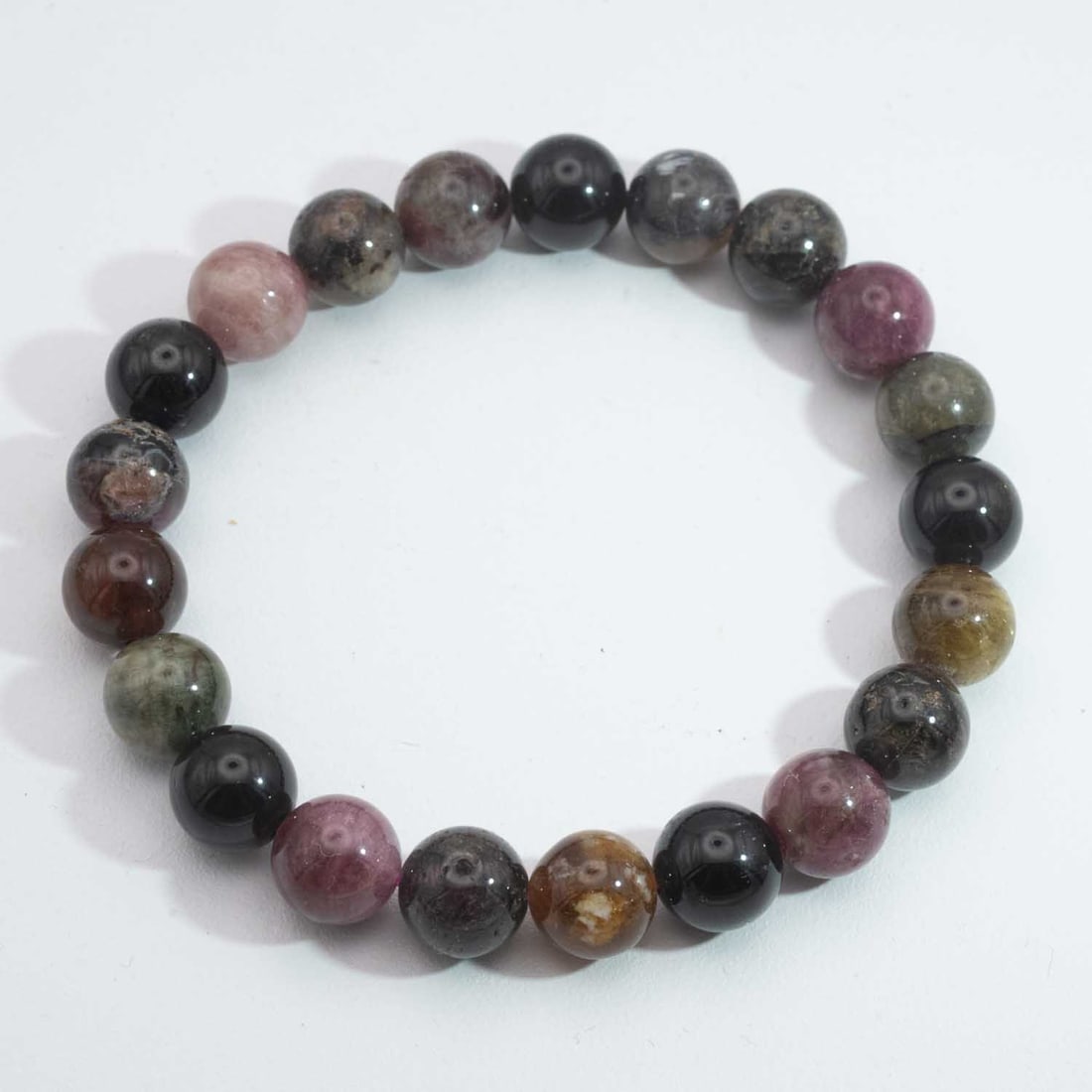 Vintage Natural Tourmaline Bead Bracelet: Medium: Tourmaline Size: 9mm Age/Detail: Vintage Natural Condition: great overall, check photo for condition reference. Provenance: Collection from Estate in Williamsburg LiveShipping is NOT a part of