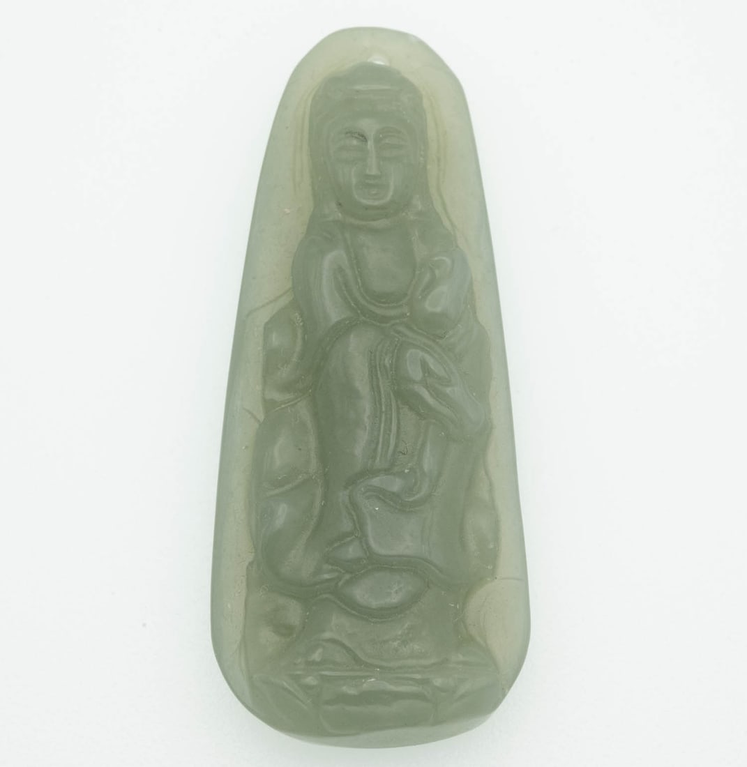 Carved Green Jade Bodhisattva Pendant: Medium: Green Jade Size: 2x1 inches Age/Detail: Carved Condition: Great, check photo for detail Provenance: Collection from Estate in Tribecca Please view all the photos as they are part of the condit