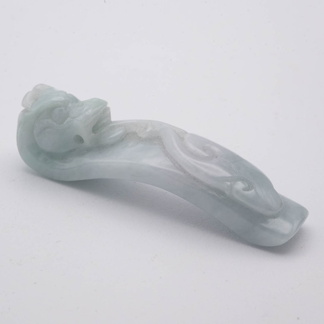 A Hand Carved Chinese Natural White And Green Jadeite Dragon Ruyi Amulet: Medium: Natural White And Green Jadeite Size: 2.3x0.5x0.6 inches Age/Detail: A Hand Carved Chinese Condition: great overall, check photo for condition reference. Provenance: Collection from Estate in 