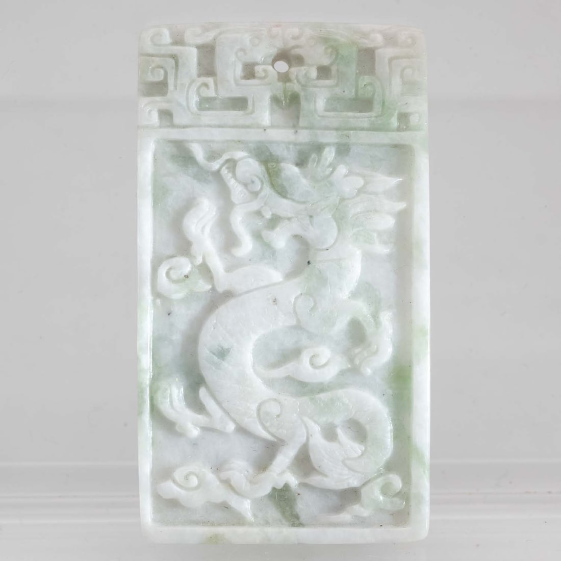 Chinese Carved Jadeite Dragon And Phoenix Pendant: Medium: Jadeite Size: 2.3x1.3x0.3 inches Age/Detail: Chinese Carved Condition: great overall, check photo for condition reference. Provenance: Collection from Estate in Tribecca LiveShipping is NOT a 