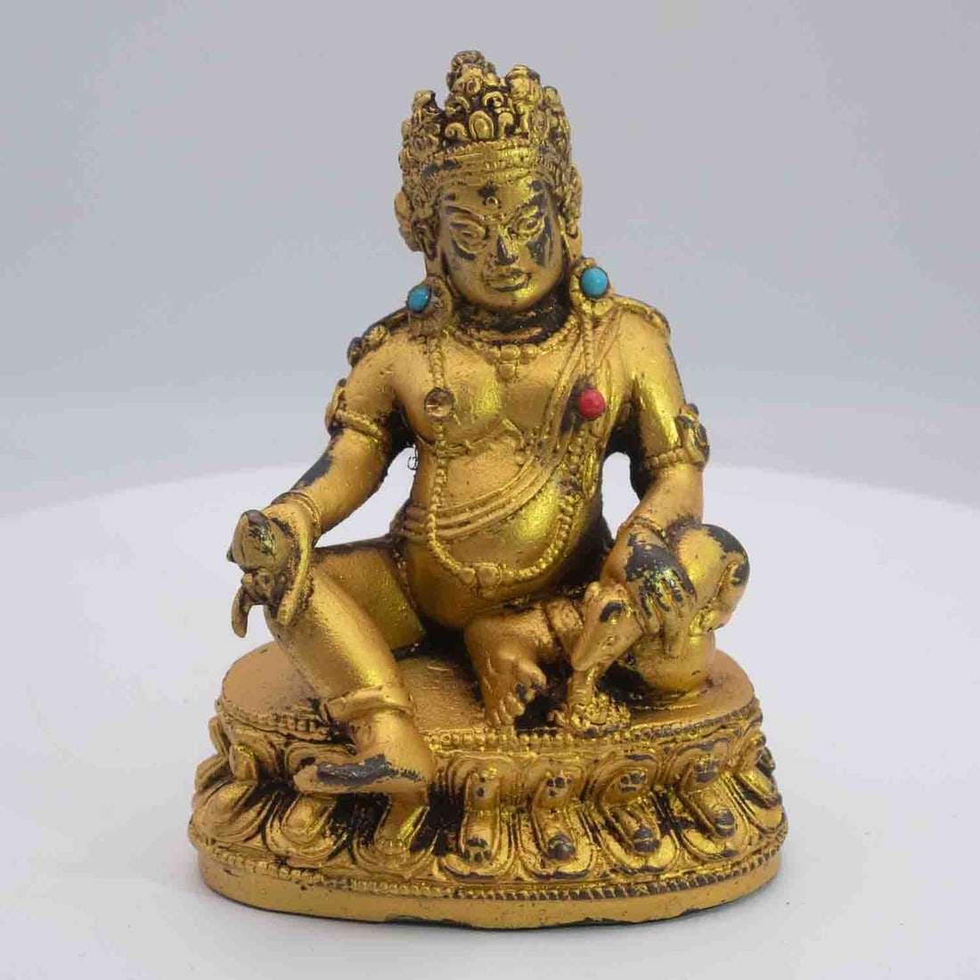 Old Chinese Gilt Bronze Buddha Figure: Medium: Gilt Bronze Size: 2.5x2x3.5 inches Age/Detail: Old Chinese Condition: great overall, check photo for condition reference. Chinese gilt metal seated Bodhisattva figure with colored inlay. Missi