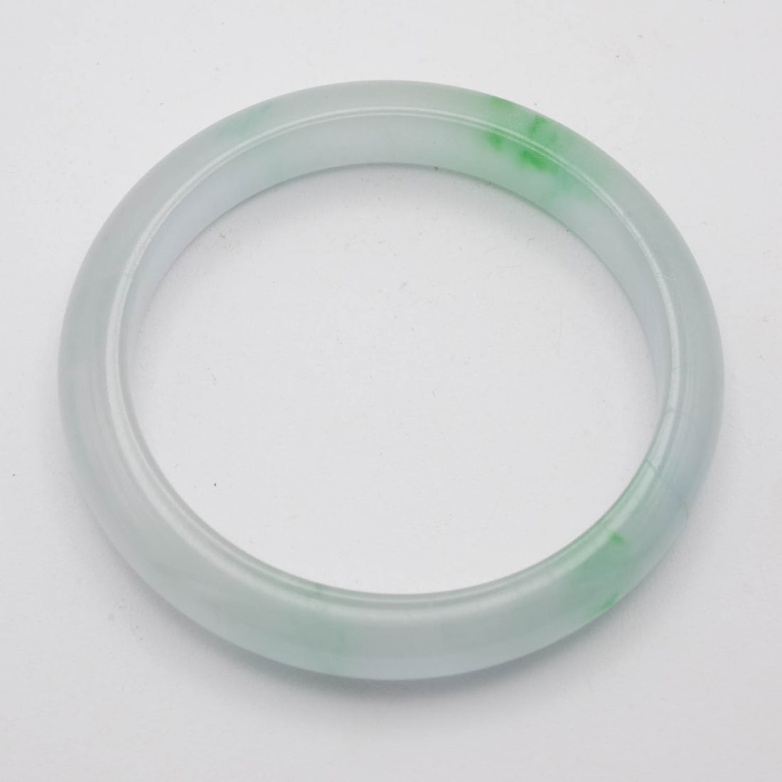 Chinese Translucent White And Green Jade Bangle: Medium: Translucent White And Green Jade Size: 2 inches Age/Detail: Chinese Condition: great overall, check photo for condition reference. Provenance: Collection from Estate in Williamsburg LiveShippi