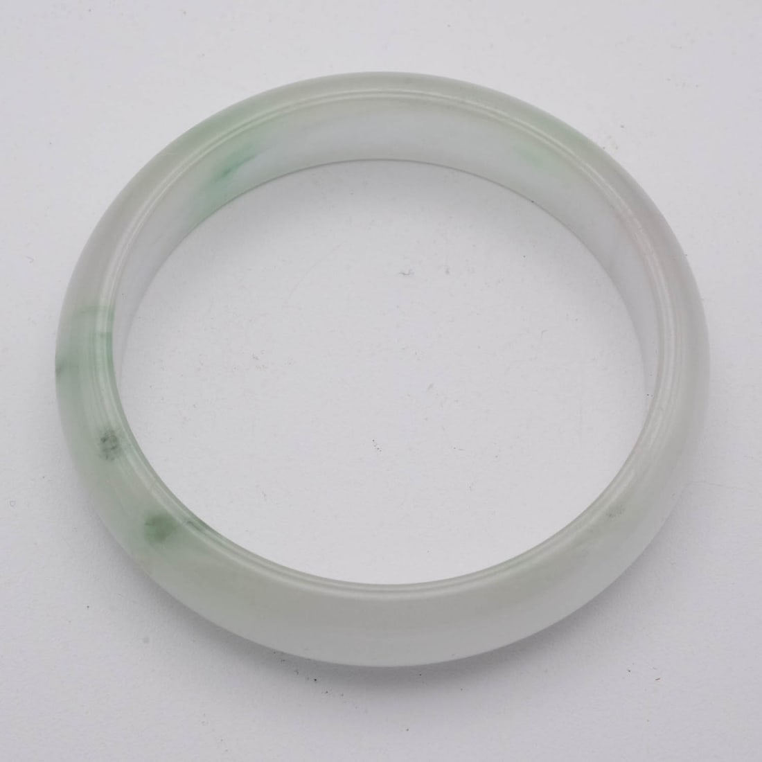 Chinese Icy White Jade Bangle: Medium: Icy White Jade Size: 2.3 inches Age/Detail: Chinese Condition: great overall, check photo for condition reference. Provenance: Collection from Estate in Williamsburg LiveShipping is NOT a part