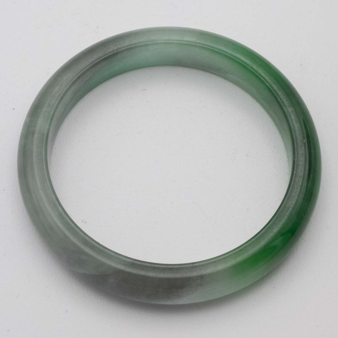 Chinese Green Jade Bangle: Medium: Green Jade Size: 2.1 inches Age/Detail: Chinese Condition: Great, check photo for condition reference Provenance: Collection from Estate in Tribecca Please view all the photos as they are part