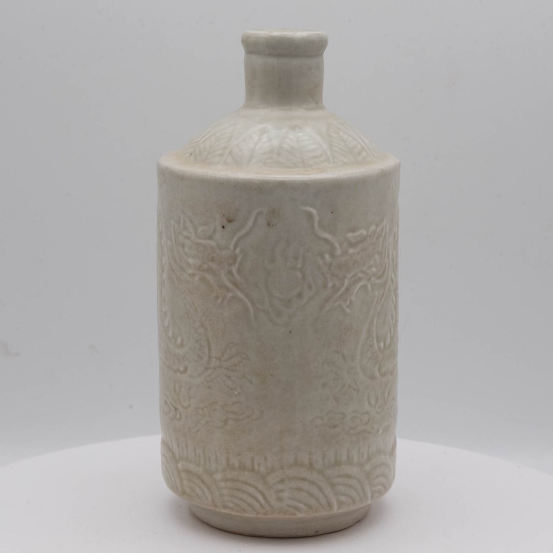 Old Chinese White Glaze Porcelain WIne Bottle: Medium: White Glaze Porcelain Size: 6x3x3 inches Age/Detail: Old Chinese Condition: great overall, check photo for condition reference. Provenance: Collection from Estate in Tribecca LiveShipping is N