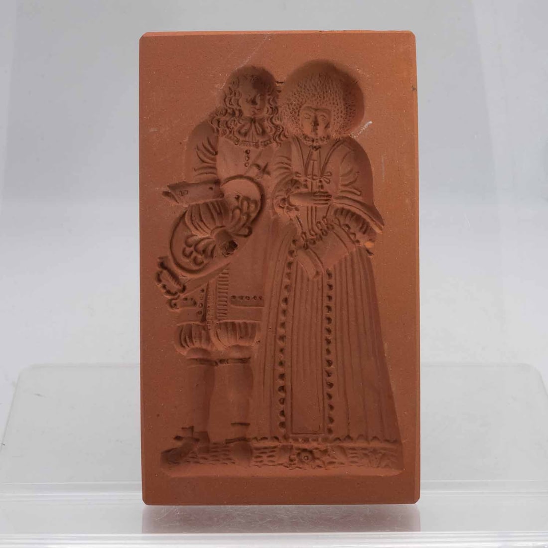 Vintage European Terracotta Relief Plaque: Medium: Terracotta Size: 6.3x3.7x0.7 inches Age/Detail: Vintage European Condition: great overall, check photo for condition reference. Terracotta relief plaque depicting a European couple in traditio