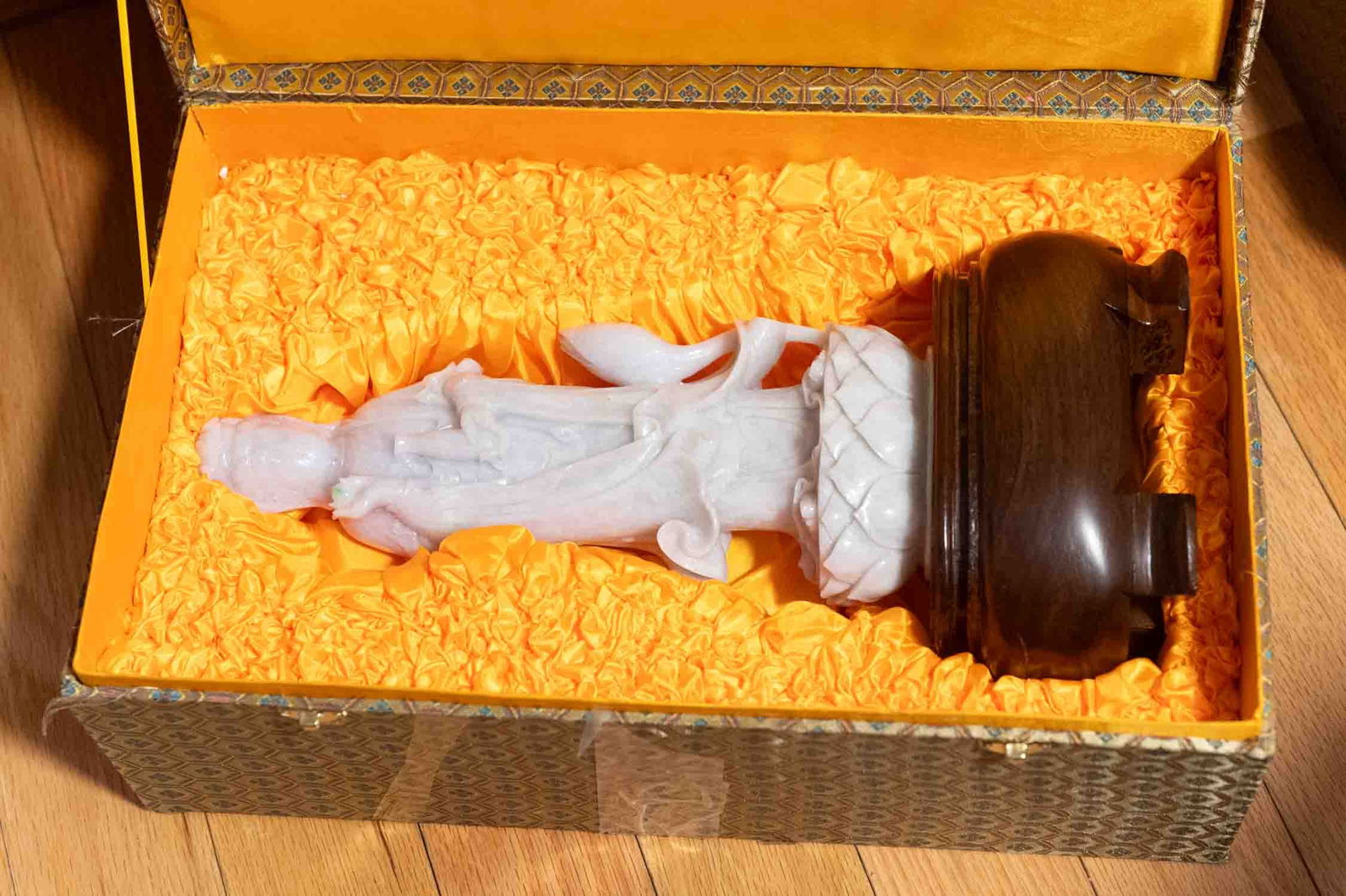 Chinese Hand-Carved Natural Jadeite Guanyin Bodhisattva Figure: Medium: Natural Jadeite Size: 7.5x4.5x15.5 inches Age/Detail: Chinese Hand-Carved Condition: great overall, wood stand missing one leg, check photo for condition reference. Carved from natural jadeite