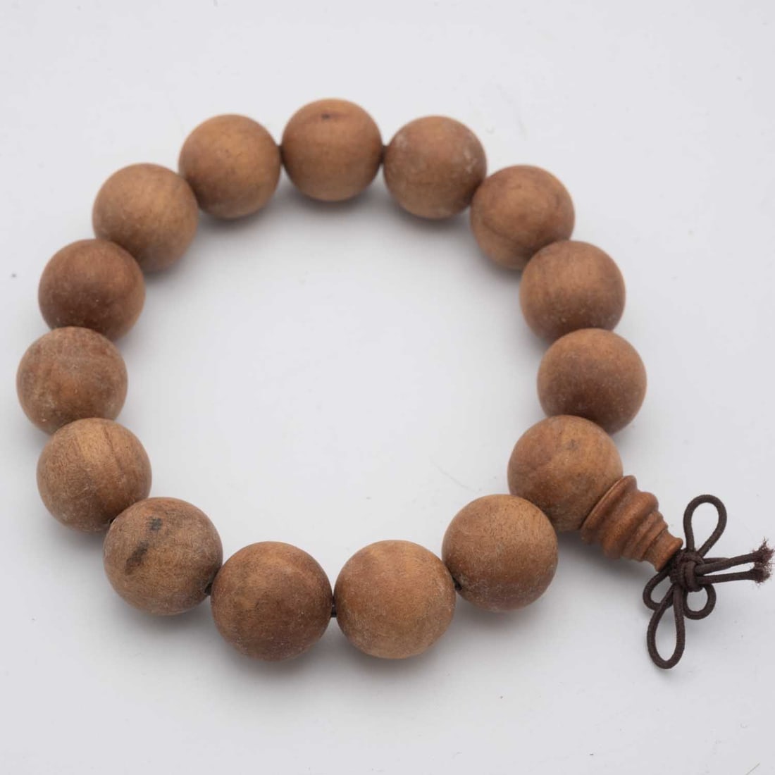 Old Chinese Sandalwood Bead Bracelet: Medium: Sandalwood Size: 15mm diameter each bead Age/Detail: Old Chinese Condition: great overall, part broken, check photo for condition reference. Provenance: Collection from Estate in Tribecca Plea