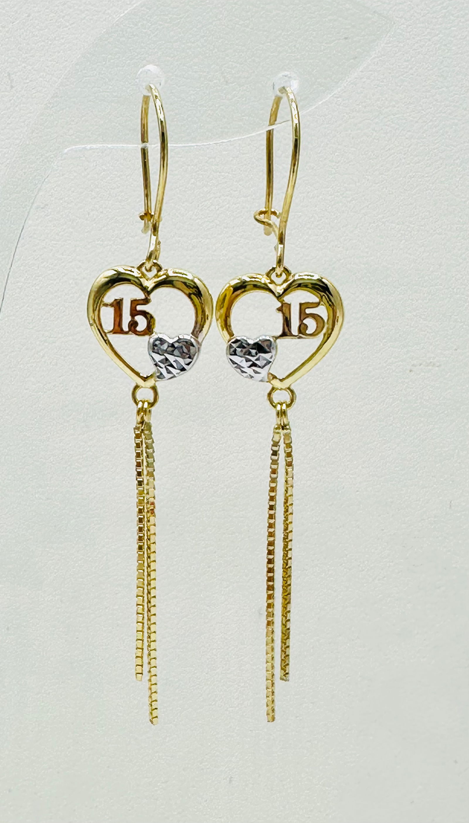 Pair of 14KT Yellow Gold Drops Earrings # 2641: # 2641 Pair of 14KT Yellow Gold Drops Earrings Earrings Weight: 2.00 grams(t.w.) Fish hook closure Earrings Size: 45 mm X 11.5 mm