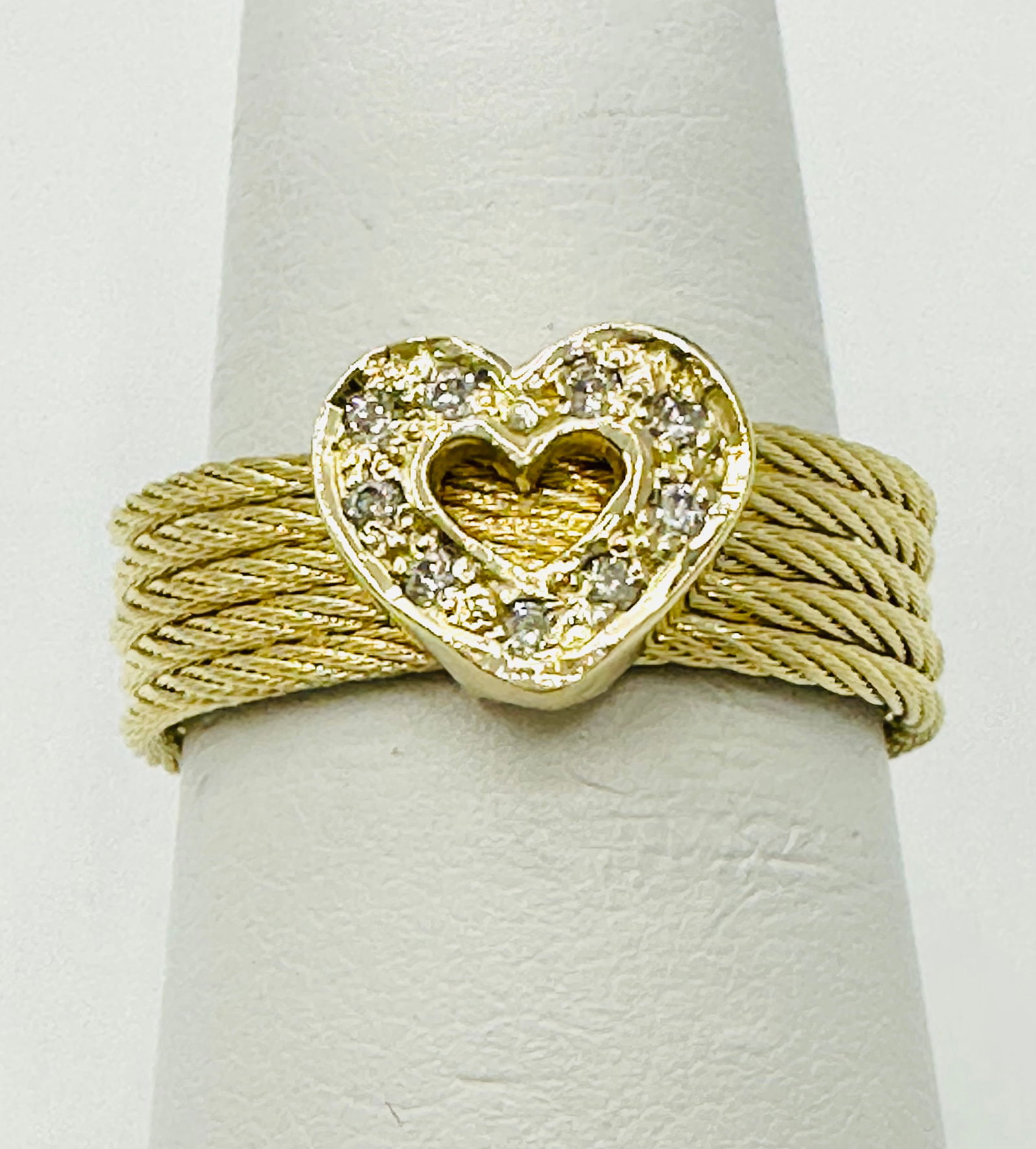 Natural Diamond Heart Ring,14KT Yellow Gold # 2761: # 2761 Natural Diamond Heart Ring,14KT Yellow Gold 9 pieces diamond 0.06carat( t.w.) Ring Weight: 4.8 grams(t.w.) Ring Size: 6.75