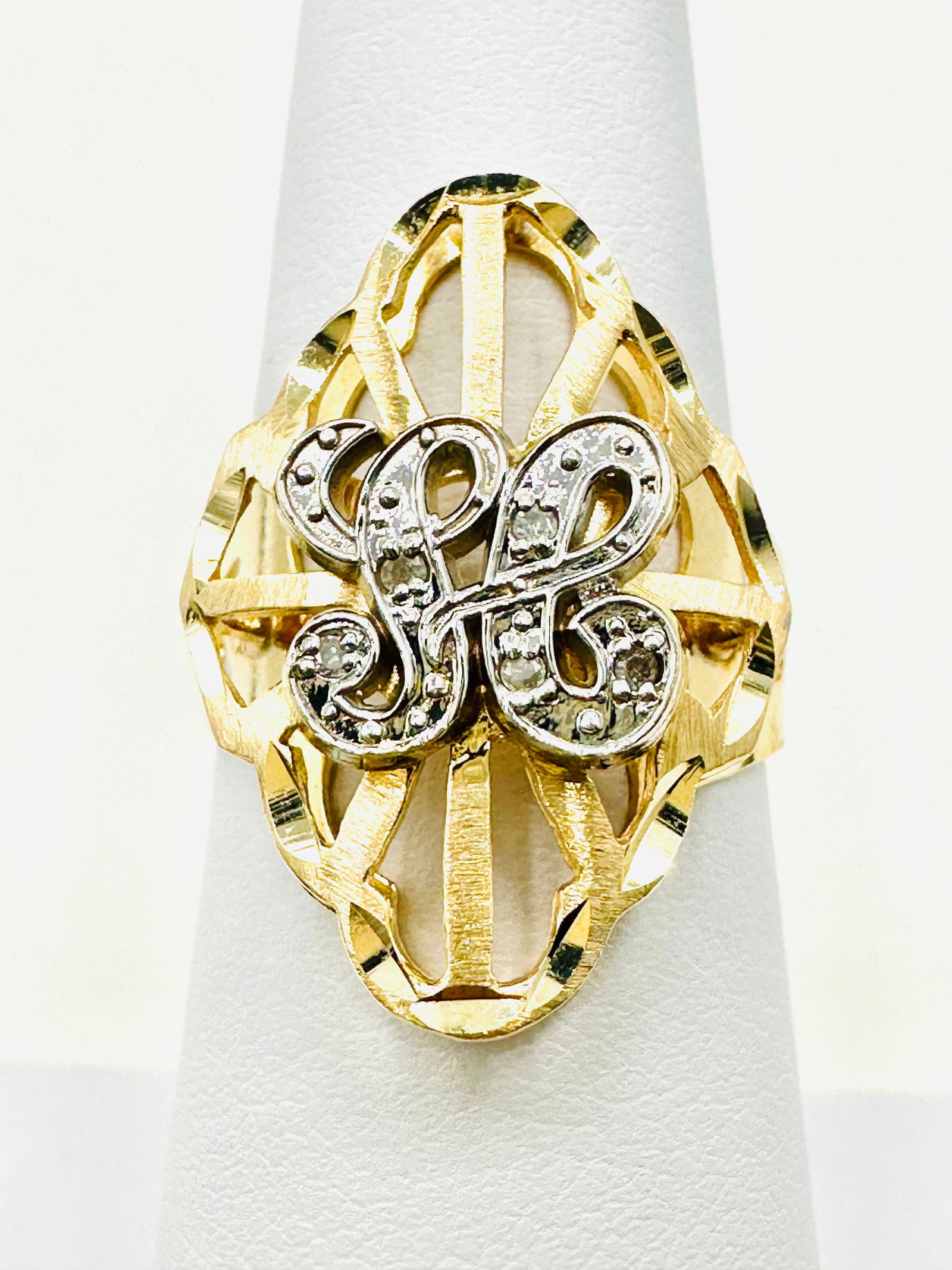 14KT Gold Initial “H??Fancy Ring, 2-Tone With Diamond Size 7 - J11287: * 14KT Gold Initial “H”Fancy Ring, 2-tone with diamond * 5 Diamond 0.03 carat (t.w.) * Ring Weight: 3.0 grams * Ring size 7 * measurement: 23 mm x 16.5 mm * Diamond Clarity VS-SI, Color G-K, *