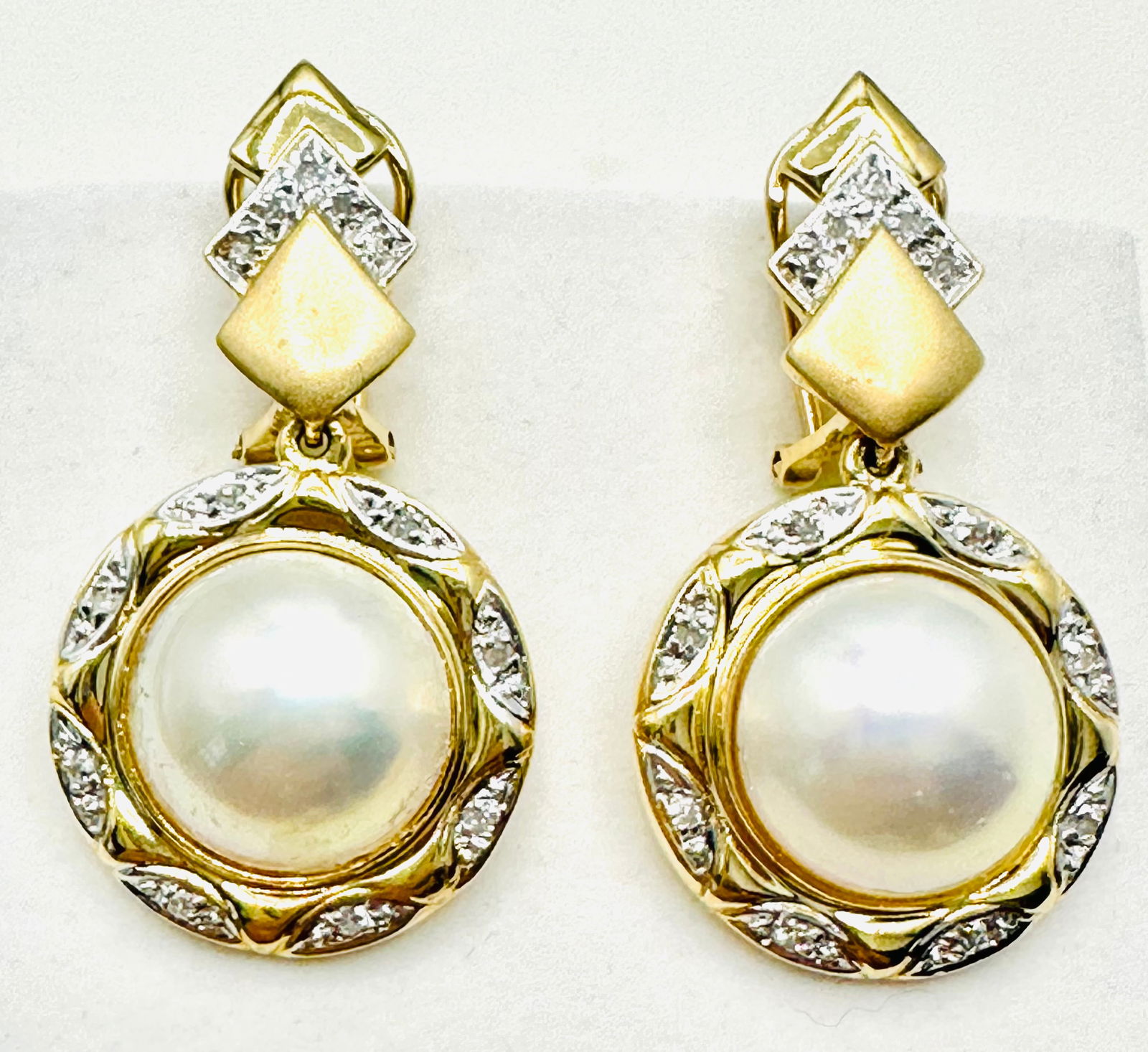 14KT Yellow Gold Pairs Of Diamond And Mobe Pearl Hanging Earrings With French Back - J11314: * 14KT Yellow Gold * Pairs of Diamond and Mobe Pearl Hanging Earrings with French Backs * 26 pcs Round Diamond 0.20 carats (t.w.) * Diamond Clarity VS-SI, Color G-K, * Condition: New in Box, * 2 pcs p