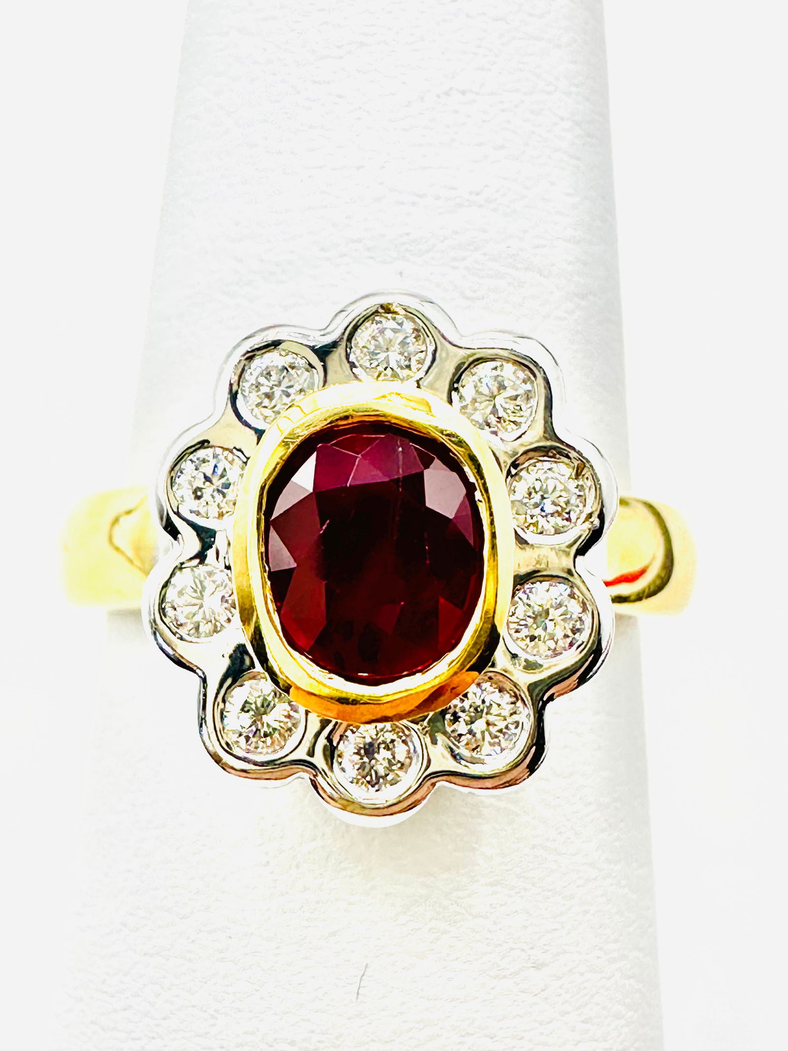 18KT Gold 2-Tones Natural Ruby And Diamond Fancy Ring Size 7 - J11379: * 18KT Gold 2-Tones, * Natural Ruby and Diamond Fancy Ring * 1 pc oval Ruby 1.00 carat * 10 pcs Diamond 0.45 carat(t.w.) * Diamond Clarity VS-SI, Color G-K, * Condition: New in Box * Ring Weight: 6.60