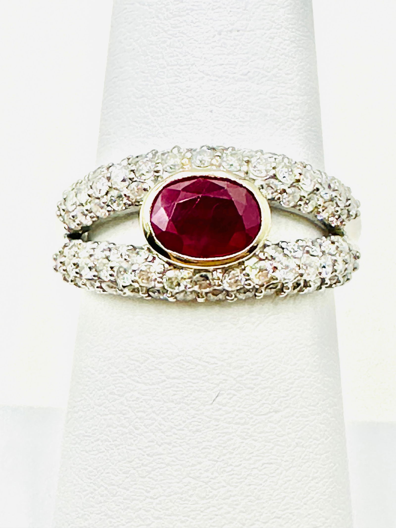 14KT White Gold Natural Ruby And Diamond Ring Size 7 - J11380: * 14KT White Gold Natural Ruby and Diamond Ring * 1 pc oval Ruby 1.00 carat * 73 pcs Diamond 1.00 carat(t.w.) * Diamond Clarity VS-SI, Color G-K, * Condition: New in Box * Ring Weight: 4.60 grams * Ri