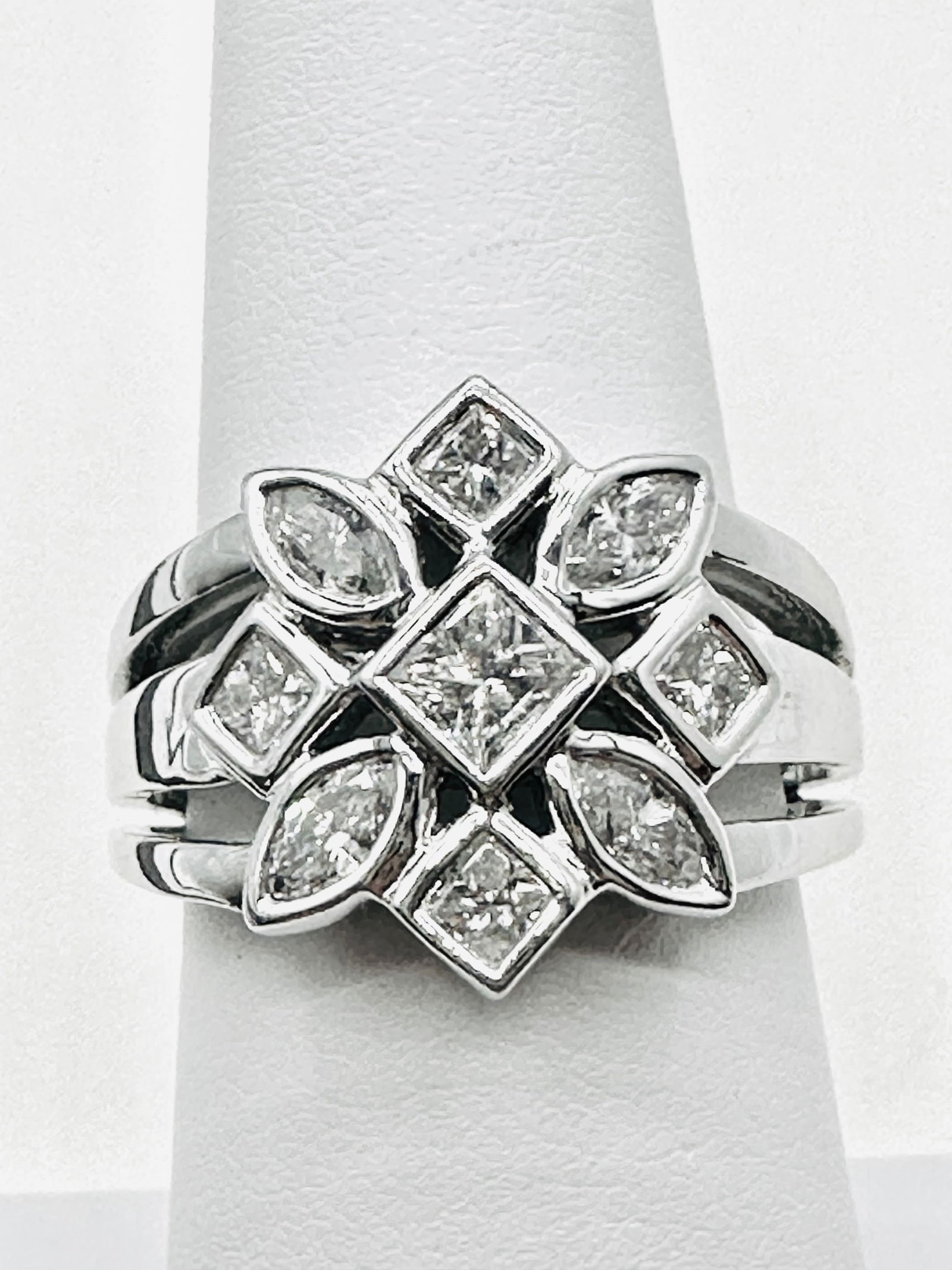 14KT White Gold Natural Diamond Fancy Ring Size 6.75 - J11388: * 14KT White Gold Natural Diamond Fancy Ring * 4 pcs marquis diamond and 5 pcs princess cut diamond 1.05 carats(t.w.) * Diamond Clarity VS-SI, Color G-K, * Condition: New in Box * Ring Weight: 7.40 gr