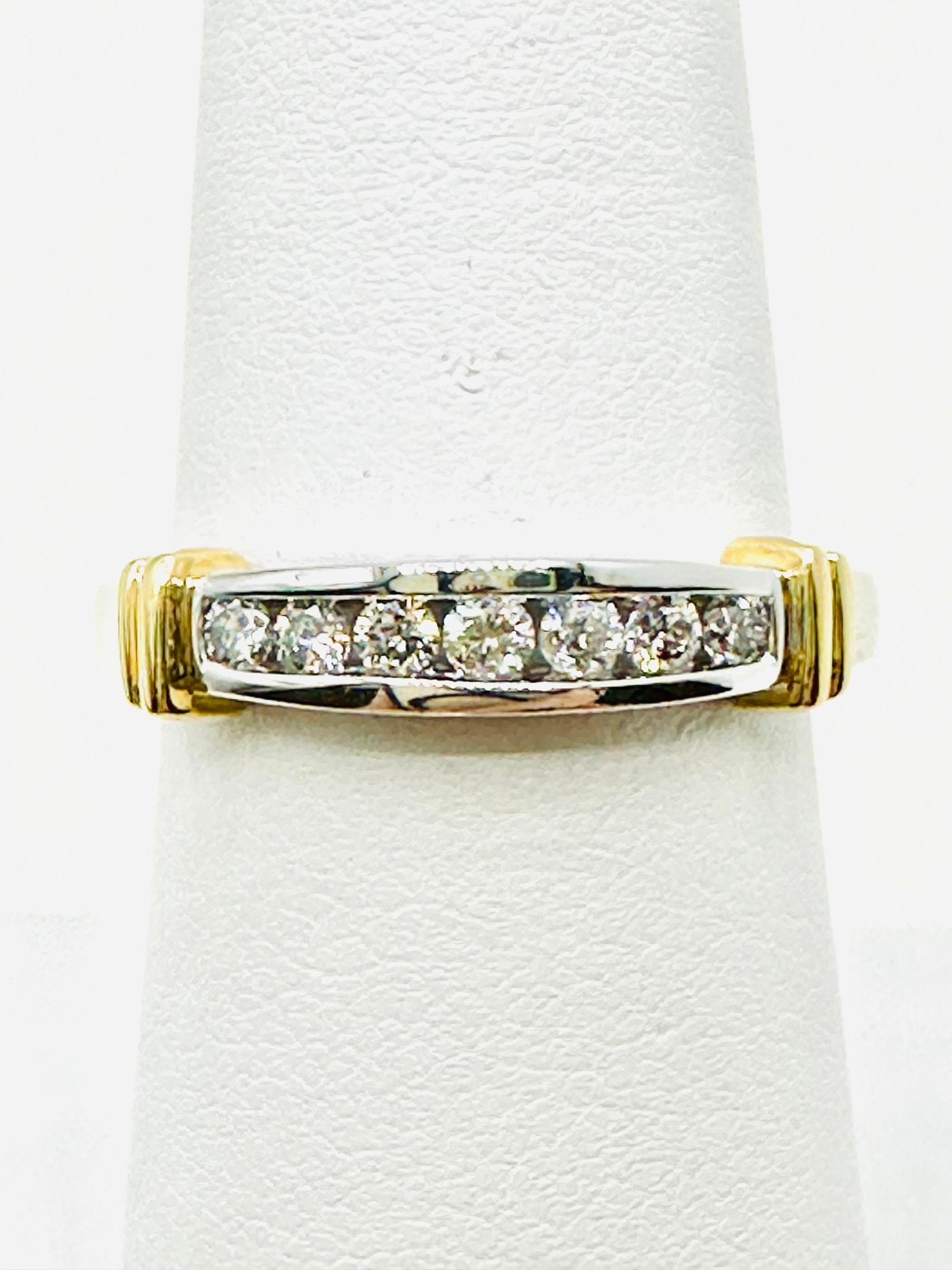 14KT White And Yellow Gold Natural Diamond Band Ring Size 7 - J11397: * 14KT White and Yellow Gold Natural Diamond Band * 7 pcs diamond 0.25 carat(t.w.) * Diamond Clarity VS-SI, Color G-K, * Condition: New in Box * Ring Weight: 3.00 grams * Ring size 7 * J11397