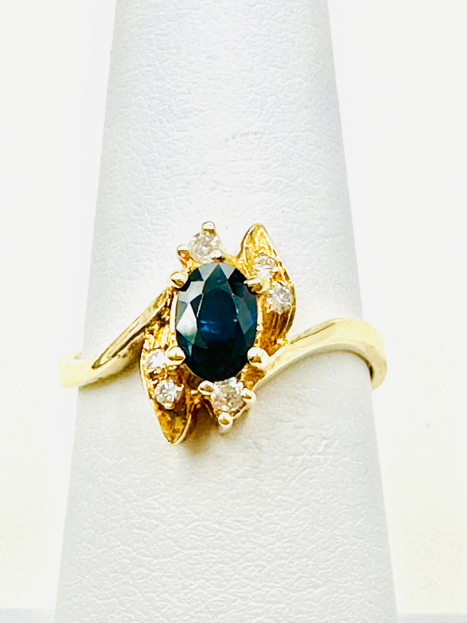 14KT Yellow Gold Natural Sapphire And Natural Diamond Ladys Ring Size 6.25 - J11413: * 14KT Yellow Gold * Natural Sapphire and Natural Diamond Lady’s Ring * 1 pc oval sapphire 0.55 carat * 6 pcs Diamond 0.16 carat(t.w.) * Diamond Clarity VS-SI, Color G-K, * Condition: New in Box * R