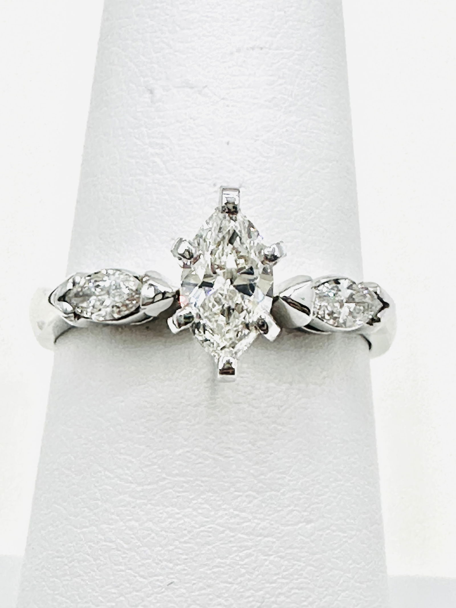 14KT White Gold Natural Marquis Diamond Engagement Ring Size 6.5 - J11431: * 14KT White Gold * Natural Marquis Diamond Engagement Ring * 1 pc marquis diamond 0.42 carat * 2 pcs marquis diamond 0.22 carat(t.w.) * Diamond Clarity VS-I, Color G-K, * Condition: New in Box * Ring
