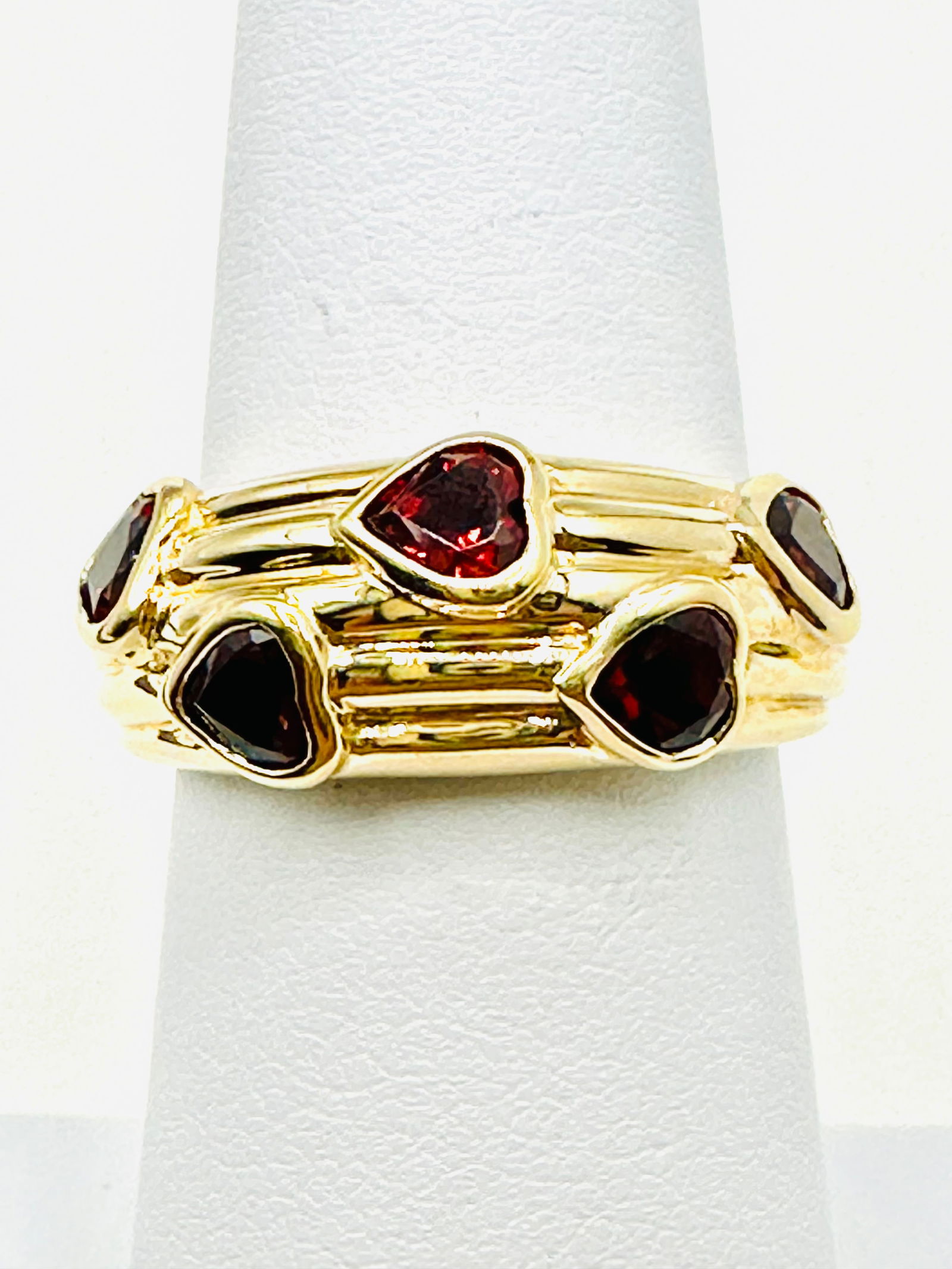 14KT Yellow Gold Heart Shaped Garnet Ring Size 6.5 - J11446: * 14KT Yellow Gold * Heart Shaped Garnet Ring * 5 pcs garnet * Weight: 4.70 grams * Condition: New in Box * Ring size 6.5 * J11446
