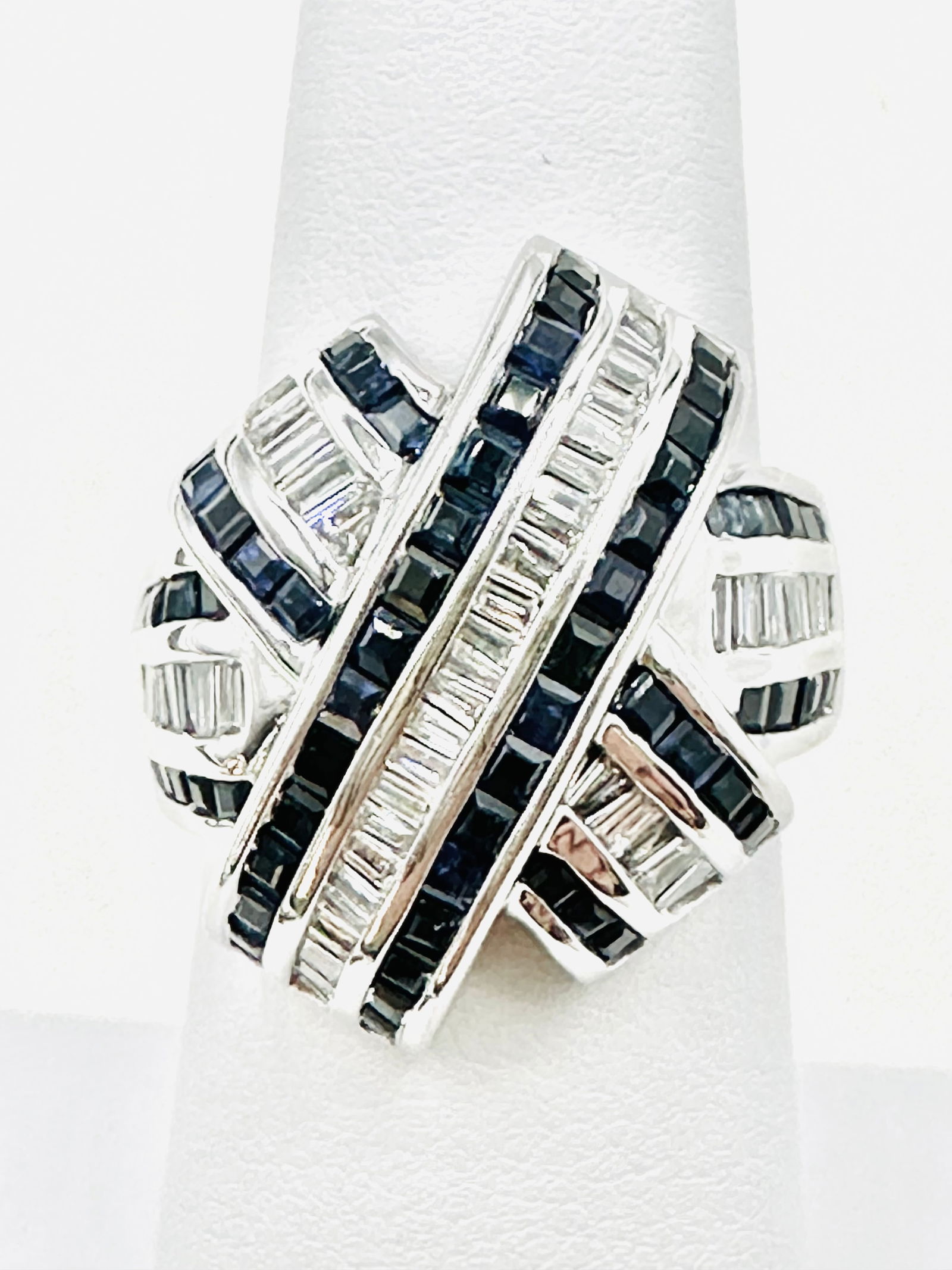 14 Karat White Gold Natural Diamond And Natural Sapphire Ring Size 6.25 - J11478: * 14 Karat White Gold * Natural Diamond and Natural Sapphire Ring * Baguette cut diamond 0.80 carat (t.w.) * Diamond Clarity VS-SI, Color G-K * Princess cut sapphire 2.00 carats ( t.w.) * Ring Weight: