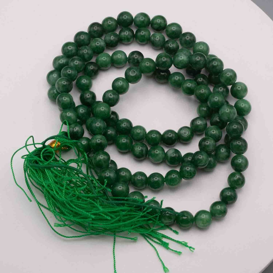 Chinese Xiu Jade Bead Auspicious Ornament: Medium: Xiu Jade Size: 39 inches Age/Detail: Chinese Condition: great overall, check photo for condition reference. Provenance: Collection from Estate in Williamsburg LiveShipping is NOT a part of the