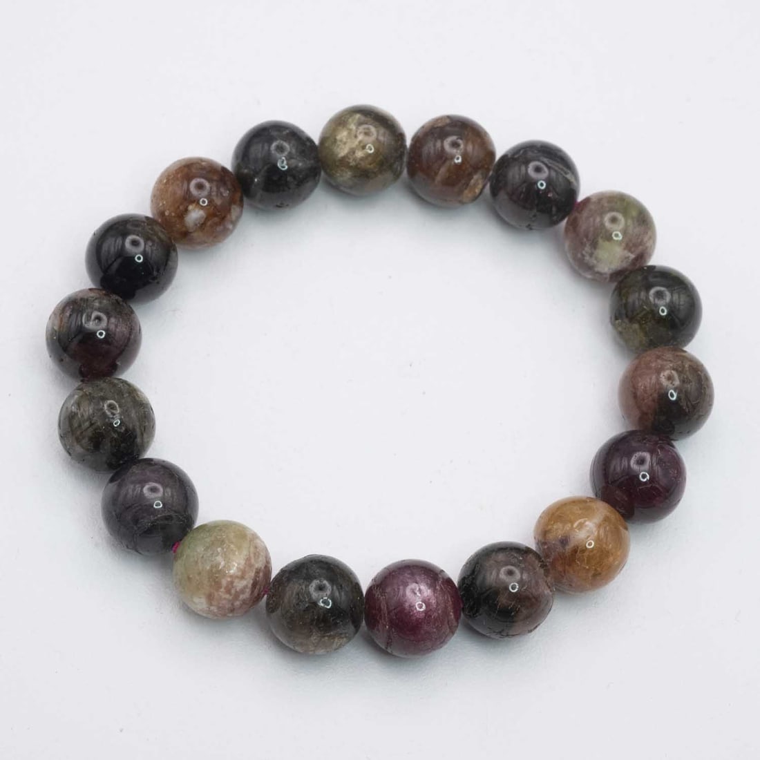 Natural Tourmaline Bead Bracelet: Medium: Tourmaline Size: 11mm diameter each bead Age/Detail: Natural Condition: great overall, check photo for condition reference. Provenance: Collection from Estate in Williamsburg LiveShipping is N