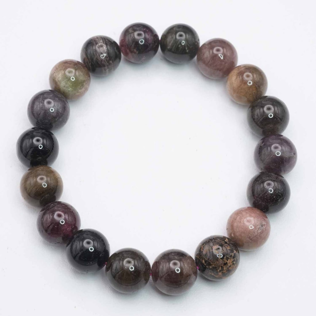 Natural Tourmaline Bead Bracelet: Medium: Tourmaline Size: 11mm diameter each bead Age/Detail: Natural Condition: great overall, check photo for condition reference. Provenance: Collection from Estate in Williamsburg LiveShipping is N