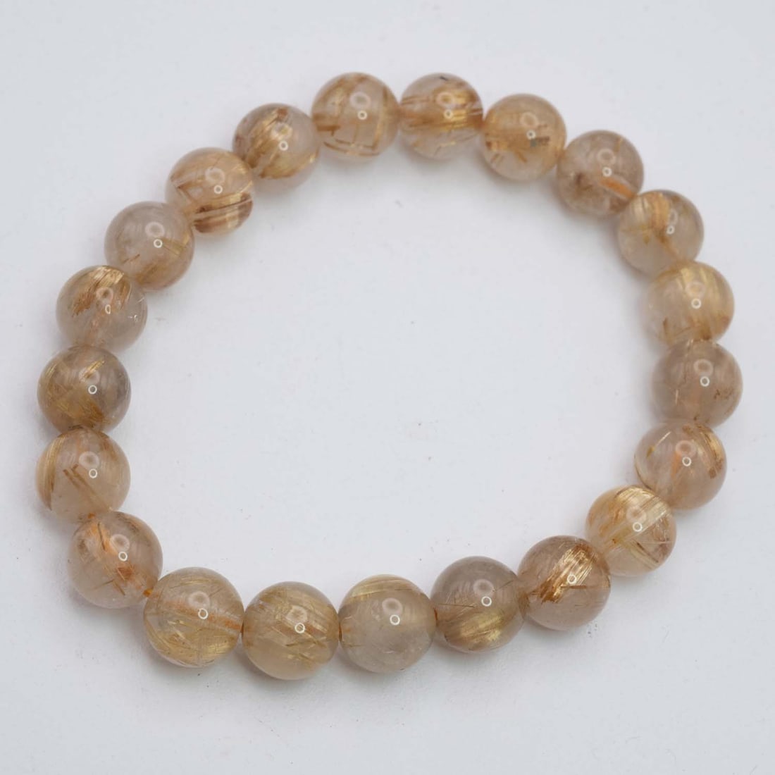 Natural Golden Rutilated Quartz Bracelet: Medium: Golden Rutilated Quartz Size: 9mm diameter each bead Age/Detail: Natural Condition: great overall, check photo for condition reference. Provenance: Collection from Estate in Williamsburg LiveS
