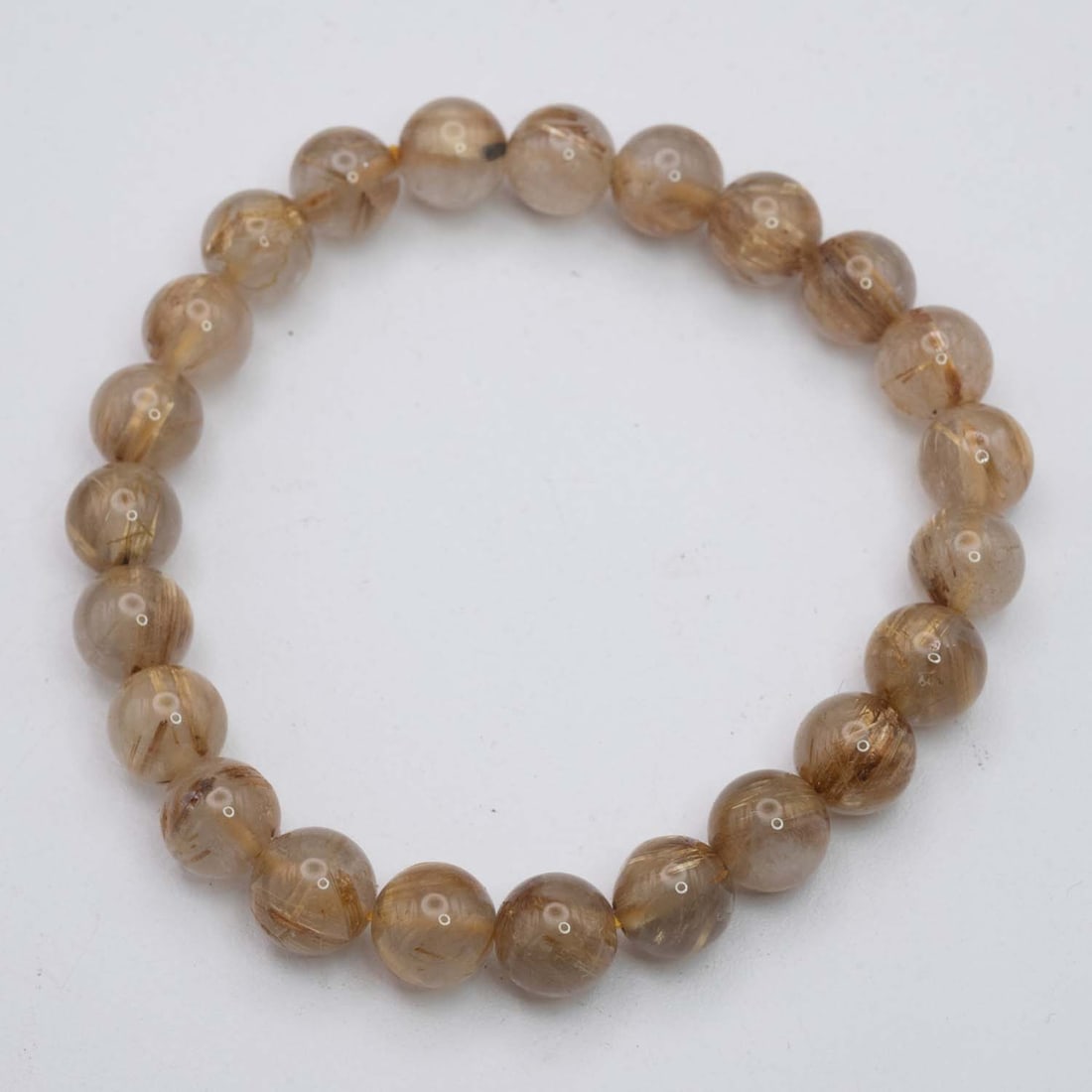 Natural Golden Rutilated Quartz Bracelet: Medium: Golden Rutilated Quartz Size: 9mm diameter each bead Age/Detail: Natural Condition: great overall, check photo for condition reference. Provenance: Collection from Estate in Williamsburg LiveS