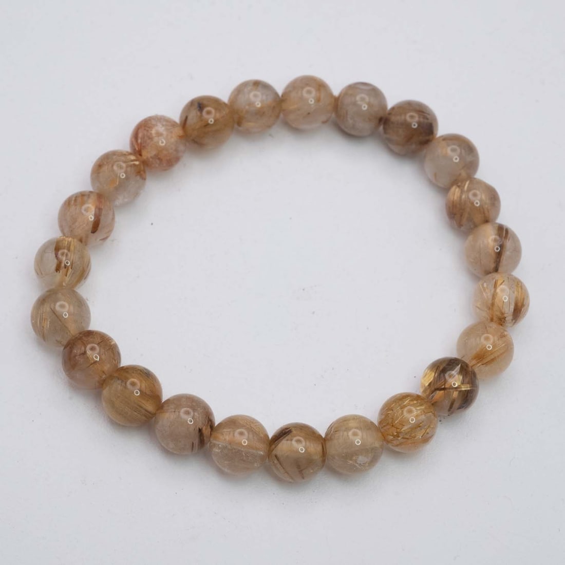 Natural Golden Rutilated Quartz Bracelet: Medium: Golden Rutilated Quartz Size: 8mm diameter each bead Age/Detail: Natural Condition: great overall, check photo for condition reference. Provenance: Collection from Estate in Williamsburg LiveS